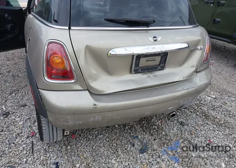 2009 Mini Cooper из США, поврежденный, VIN WMWMF33529TW77634